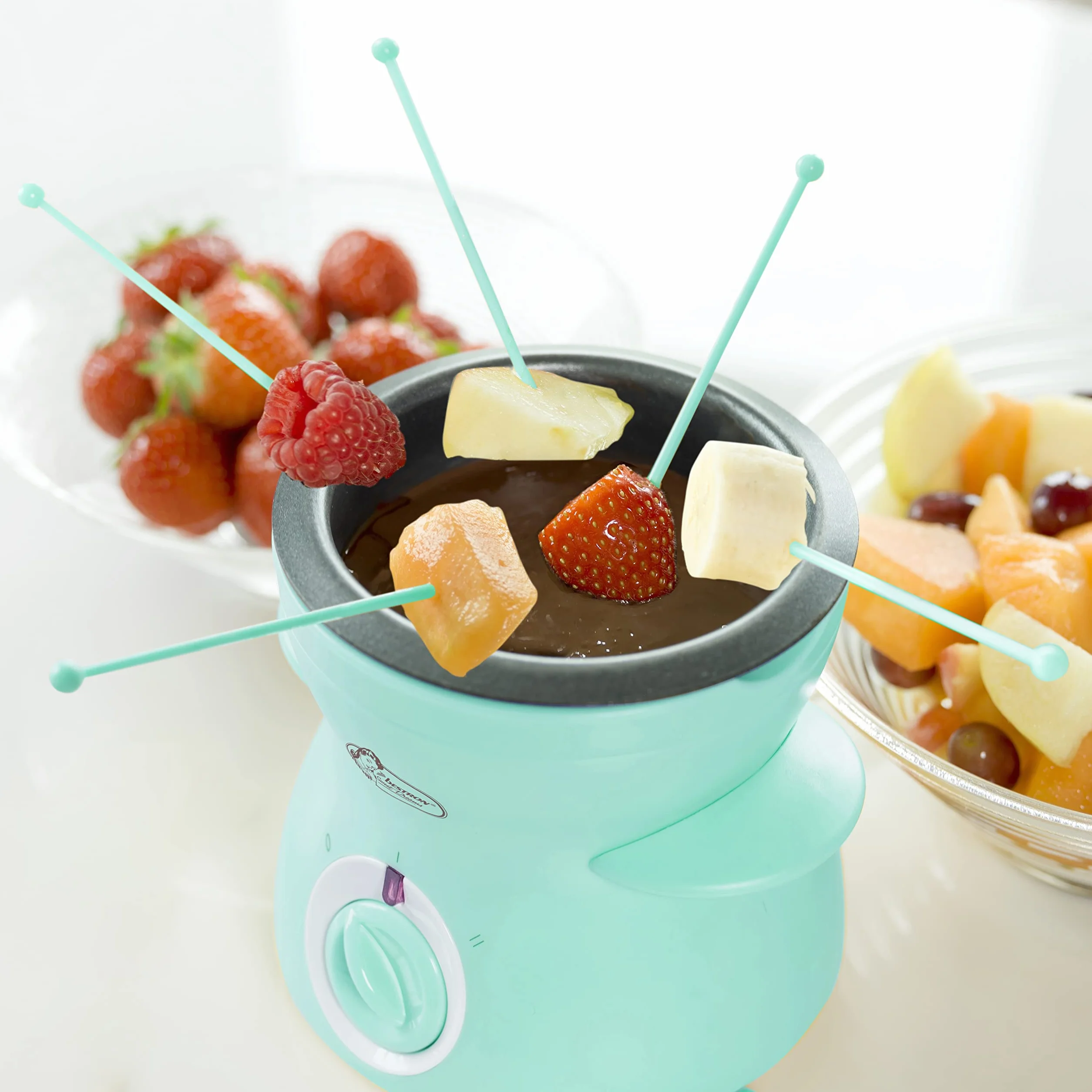 Bestron Czekoladowe fondue dla 2 osób, mini zestaw do fondue czekoladowego, w zestawie: 10 szpikulców, 10 widelców i 1 x szpachelka, 25 W, kolor: miętowy