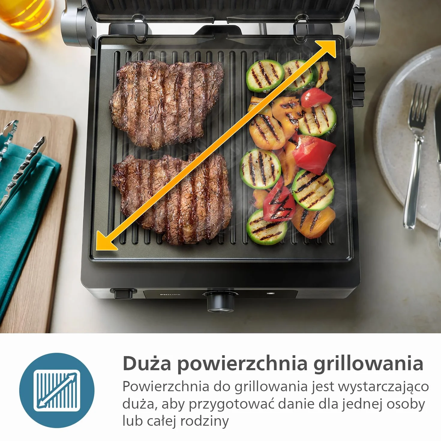 Philips Grill elektryczny - Regulowana temperatura. Duża powierzchnia grillowania i wysoka moc. Wyjmowane, nieprzywierające płytki i tacka na tłuszcz. (HD6301/90)