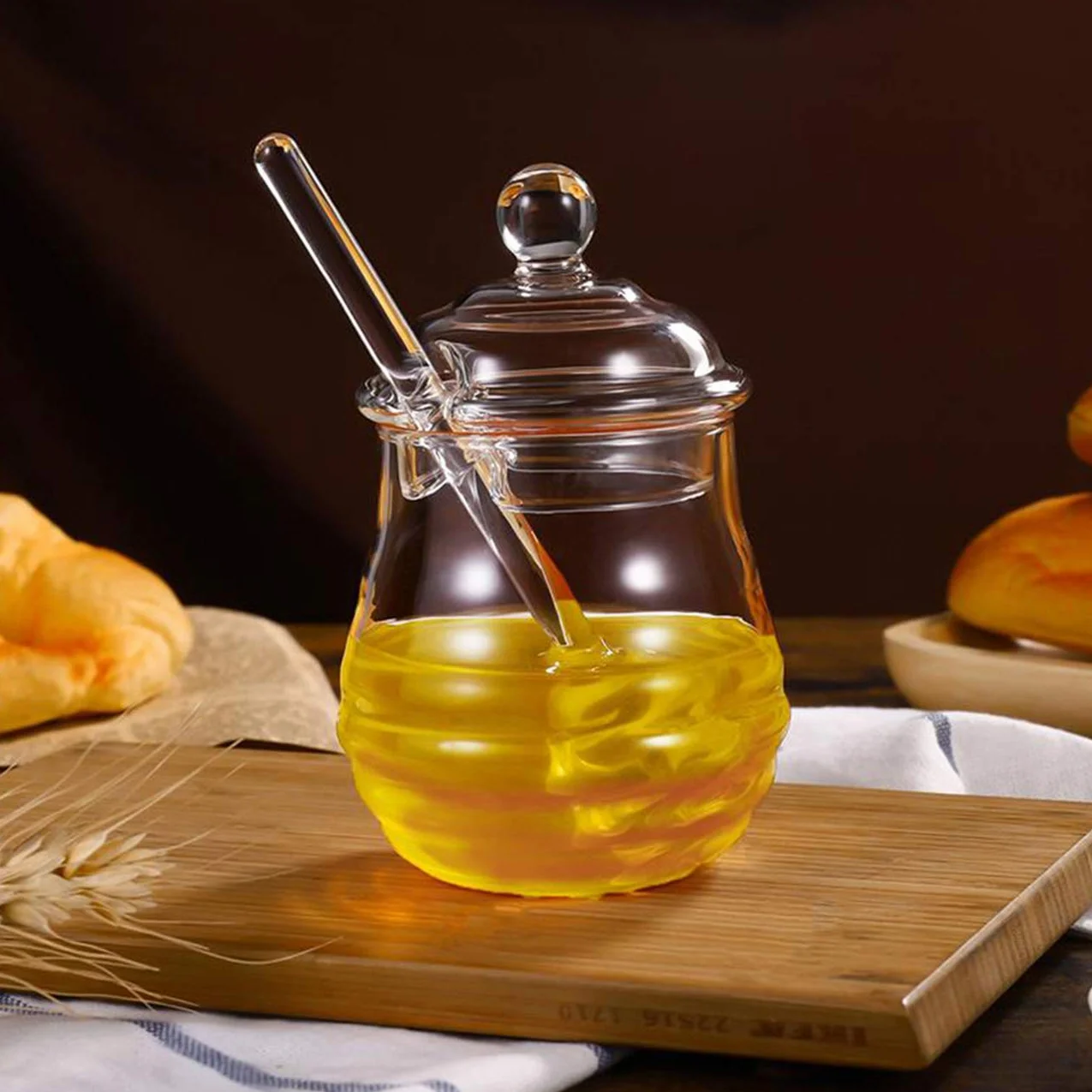GuDoQi Szklany garnek na miód z pojemnikiem i łyżeczką, słoik do serwowania miodu i syropu, 250 ml